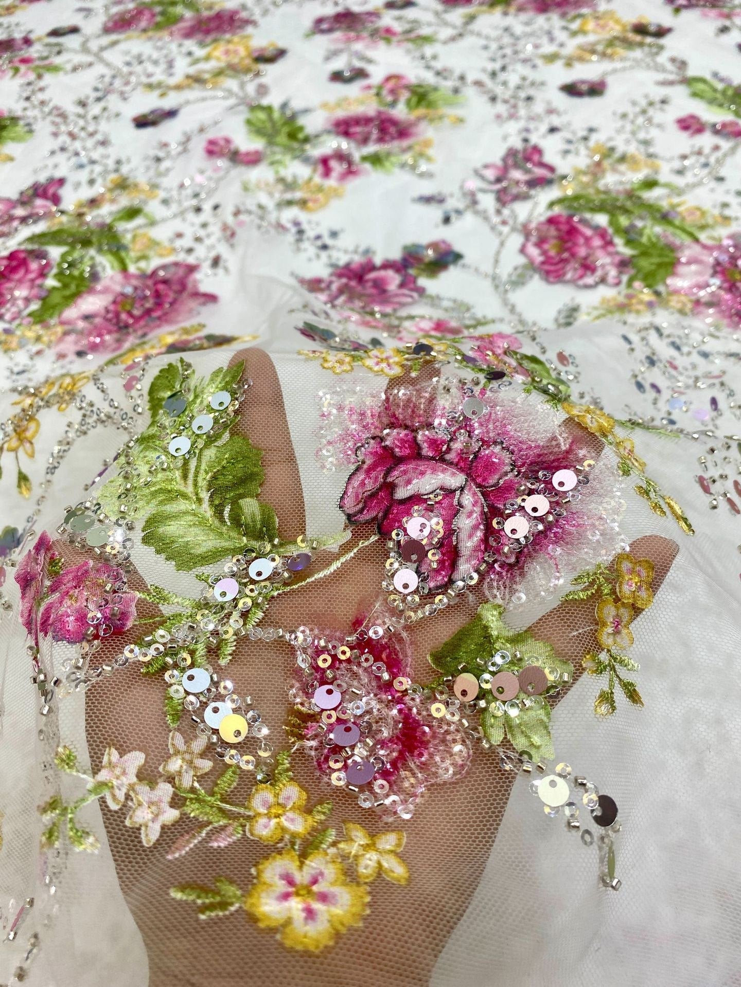 Close-up floral embroidery sequins and beads on mesh fabric for luxury dress wholesale